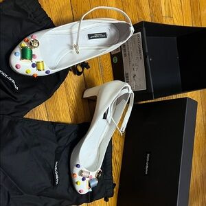 Dolce & Gabbana white Mary Jane pumps multicolor sewing-themed embellishments.39